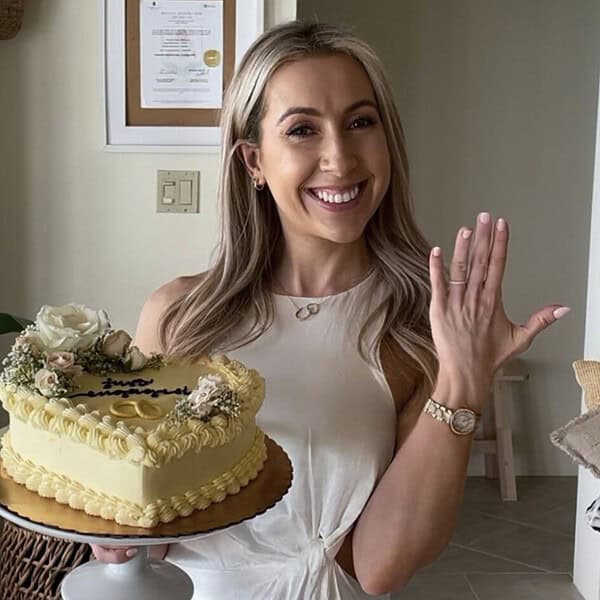 dietitian holding a cake