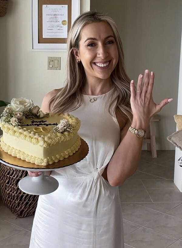 dietitian holding a cake