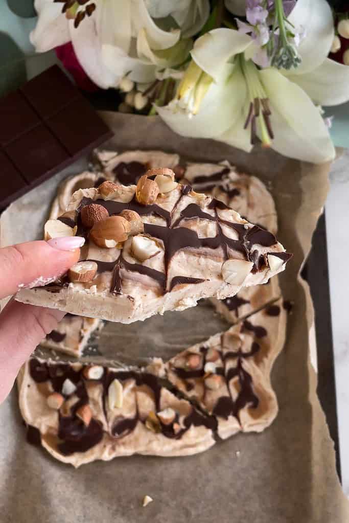 yogurt bark with chocolate and peanut butter drizzled on top