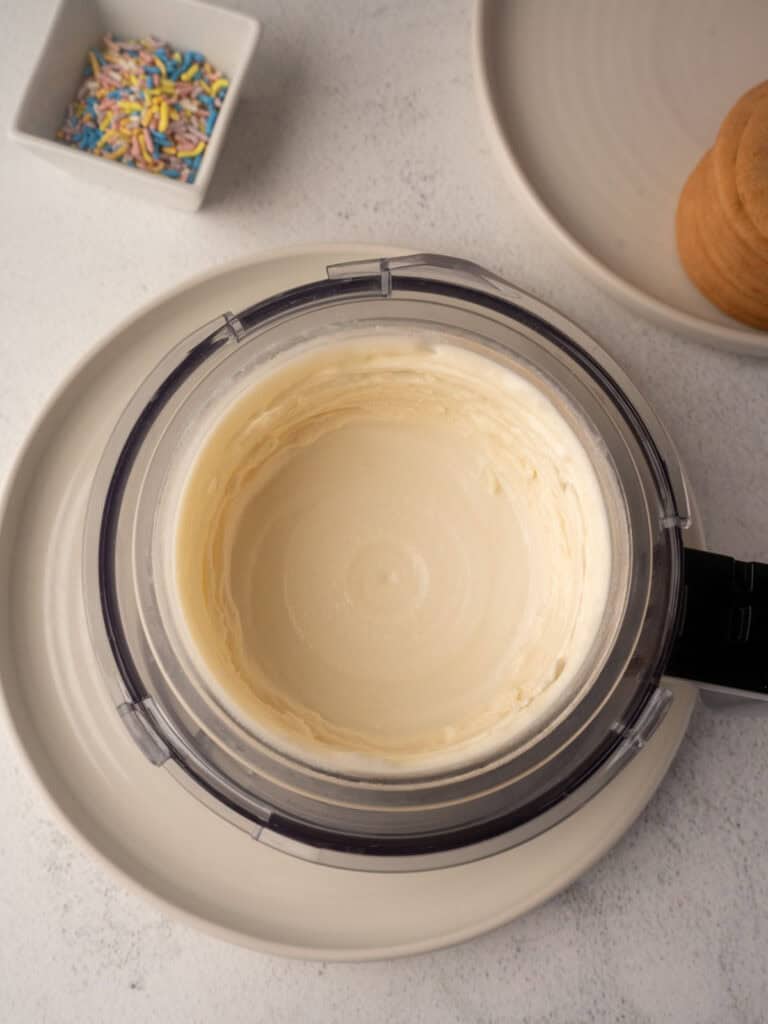 Smooth and creamy Ninja Creami vanilla ice cream after the first spin.