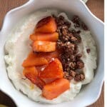 Caramelized pineapple yogurt bowl with creamy Greek yogurt and crunchy granola.