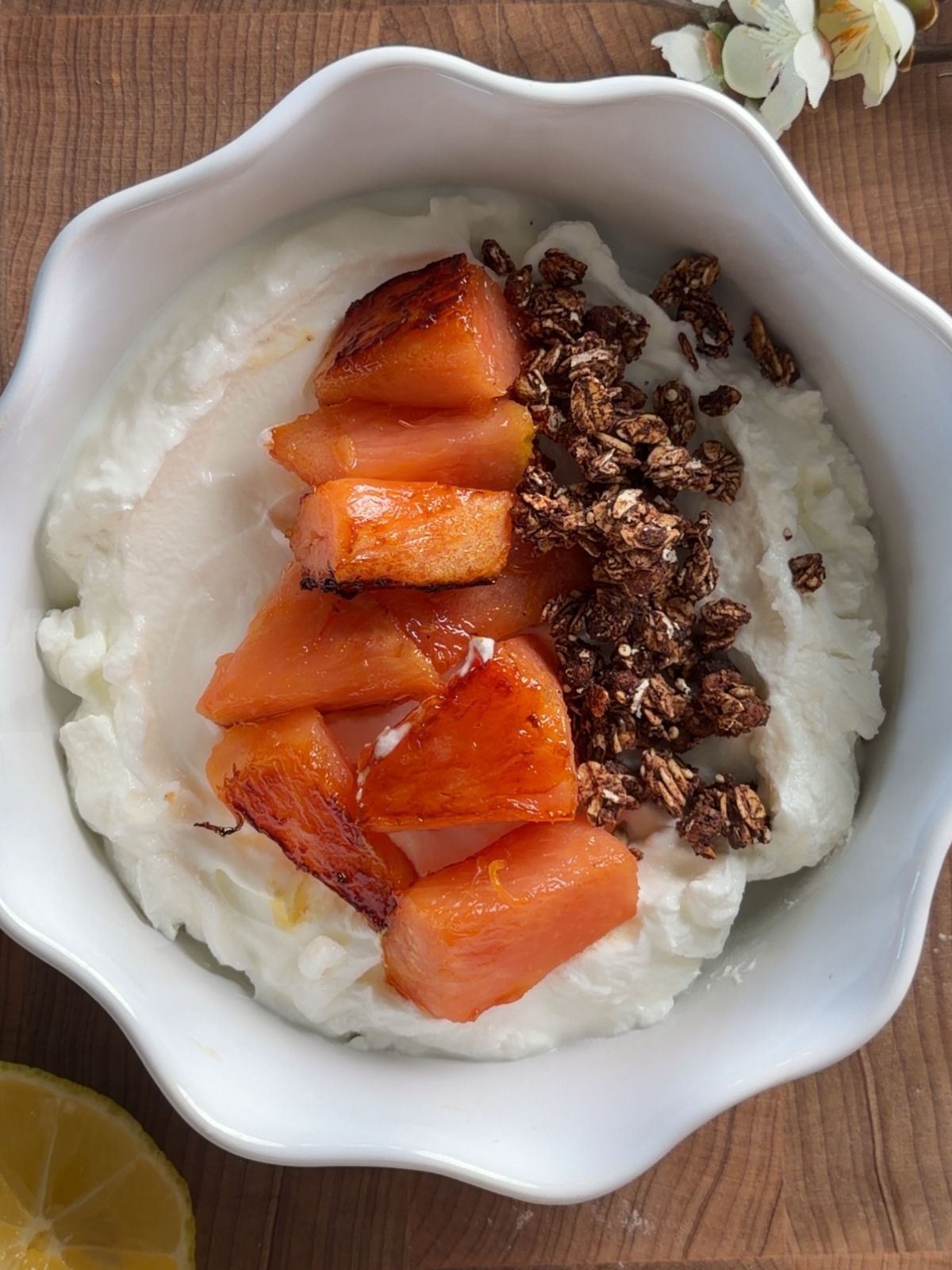 Caramelized pineapple yogurt bowl with creamy Greek yogurt and crunchy granola.