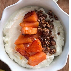 Caramelized pineapple yogurt bowl with creamy Greek yogurt and crunchy granola.