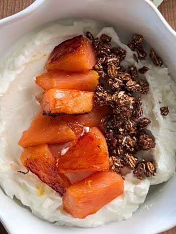 Caramelized pineapple yogurt bowl with creamy Greek yogurt and crunchy granola.