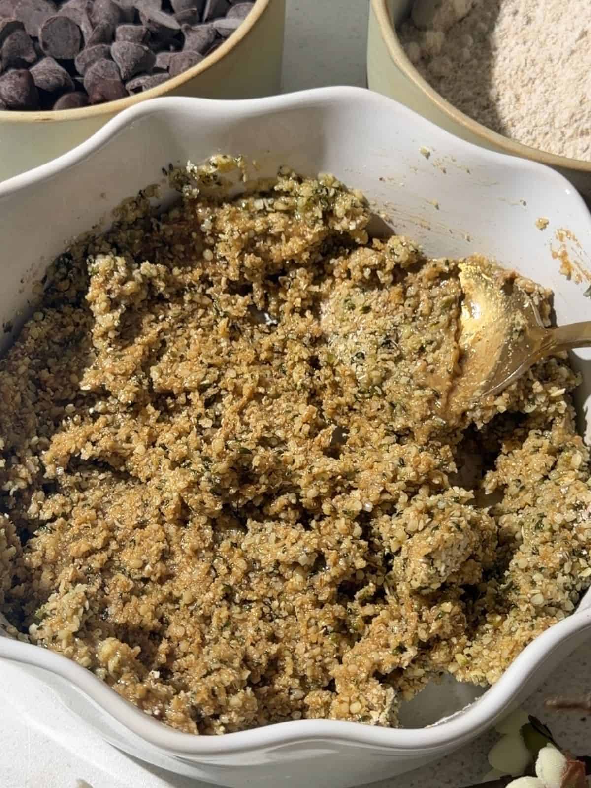 Mixed nut free protein ball dough in a white bowl