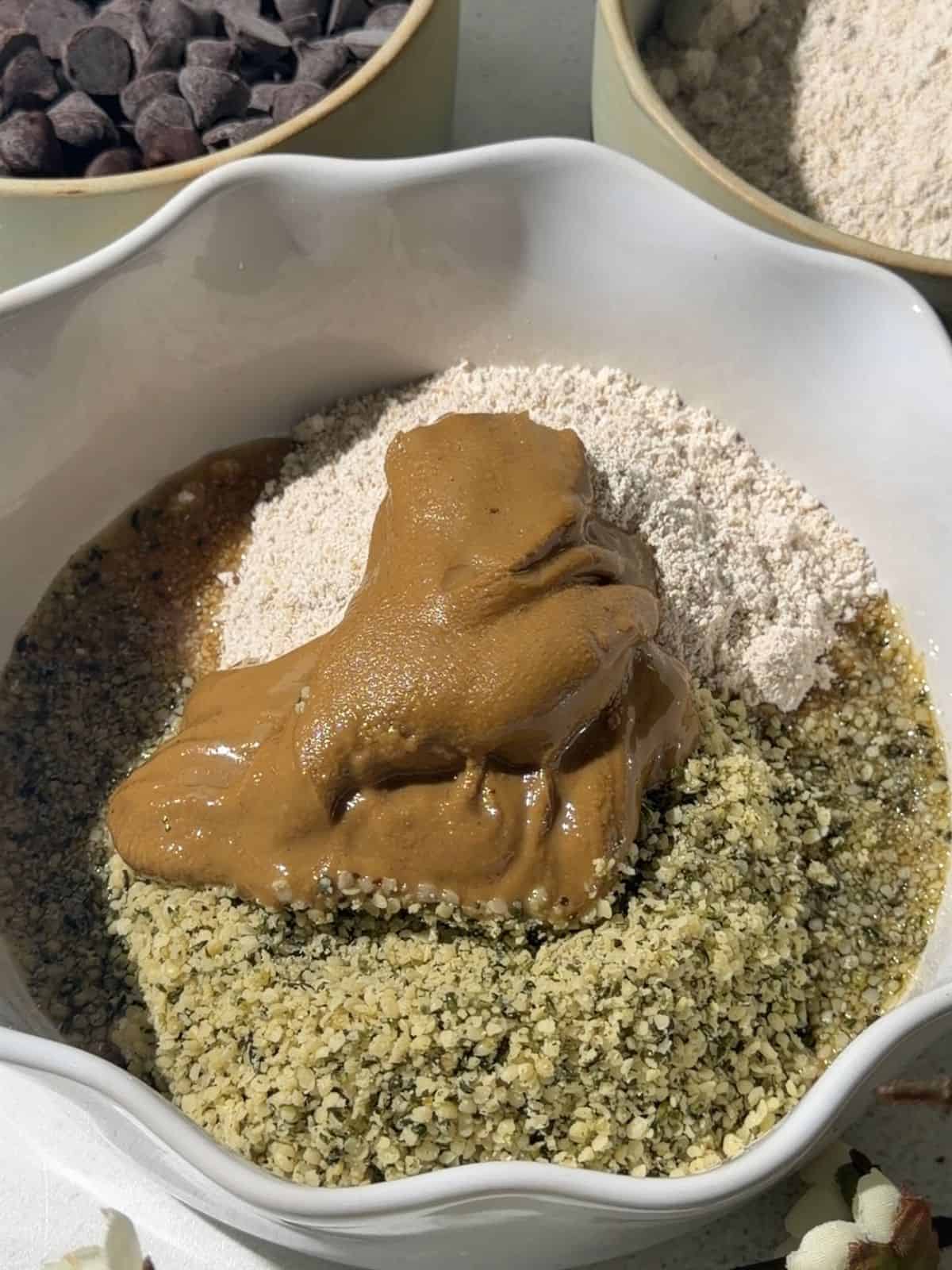 Oat flour, hemp seeds, sunflower seed butter and maple syrup for nut free protein balls
